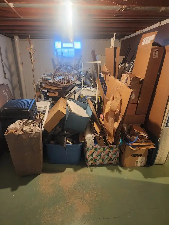 Roll-off dumpster container at job site for Yard Waste Dumpster Rental in Montrose